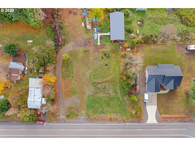 a view of a town with mountains in the background