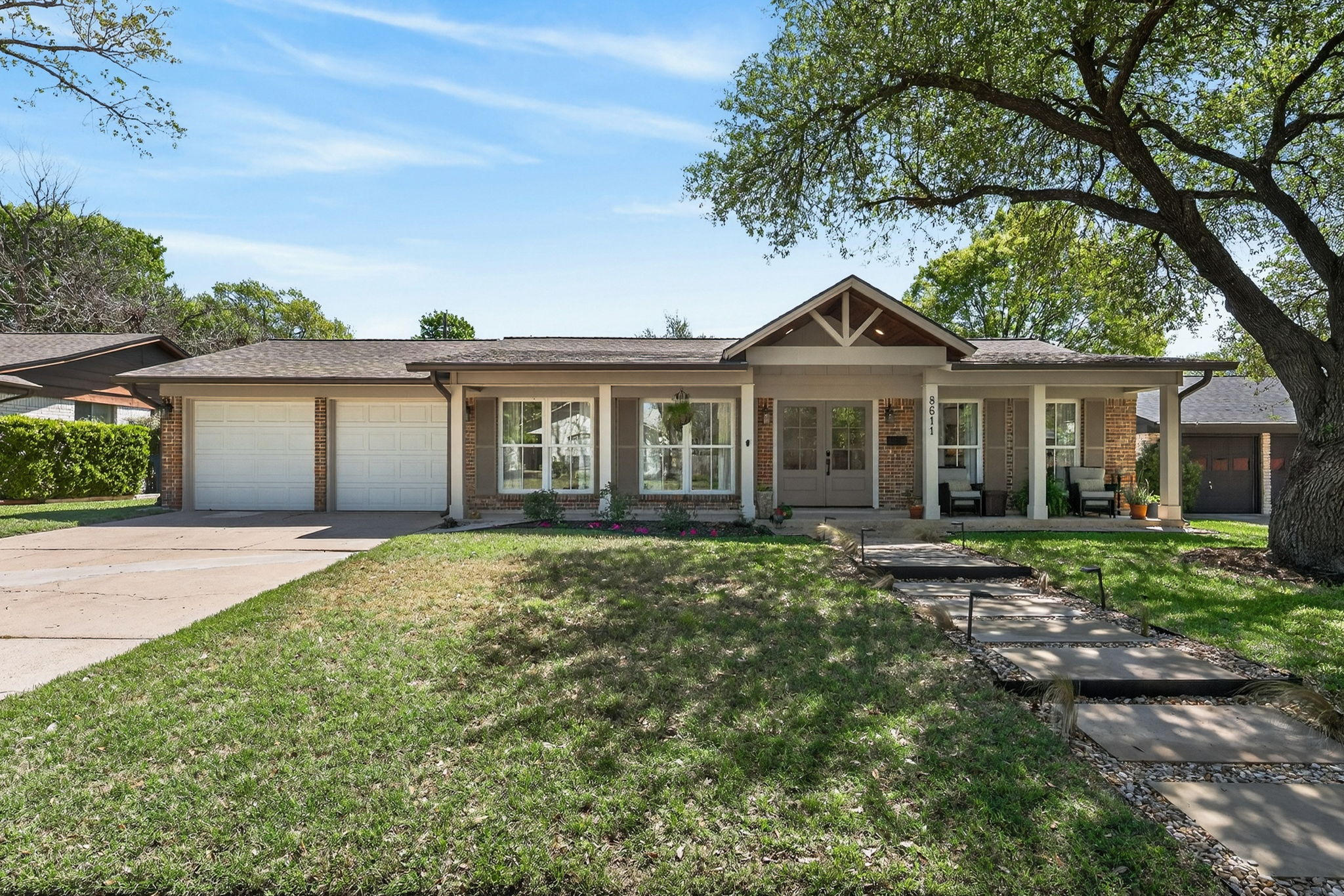 8611 Winding Walk Austin, TX 78757 - Photo 1 of 29 Welcome Home to 8611 Winding Walk, a classic Austin ranch with a modern soul.