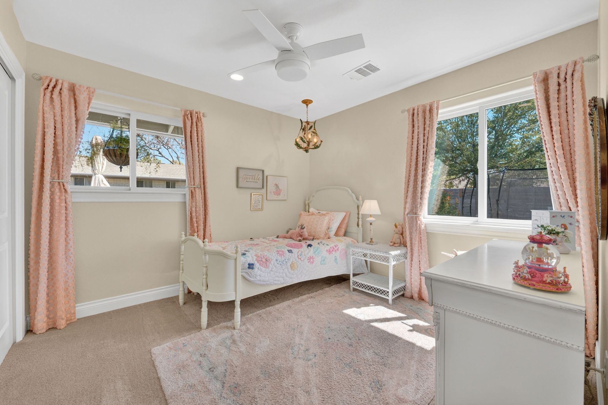 8611 Winding Walk Austin, TX 78757 - Photo 23 of 29 Bathed in soft light, this bedroom is a dreamy retreat.