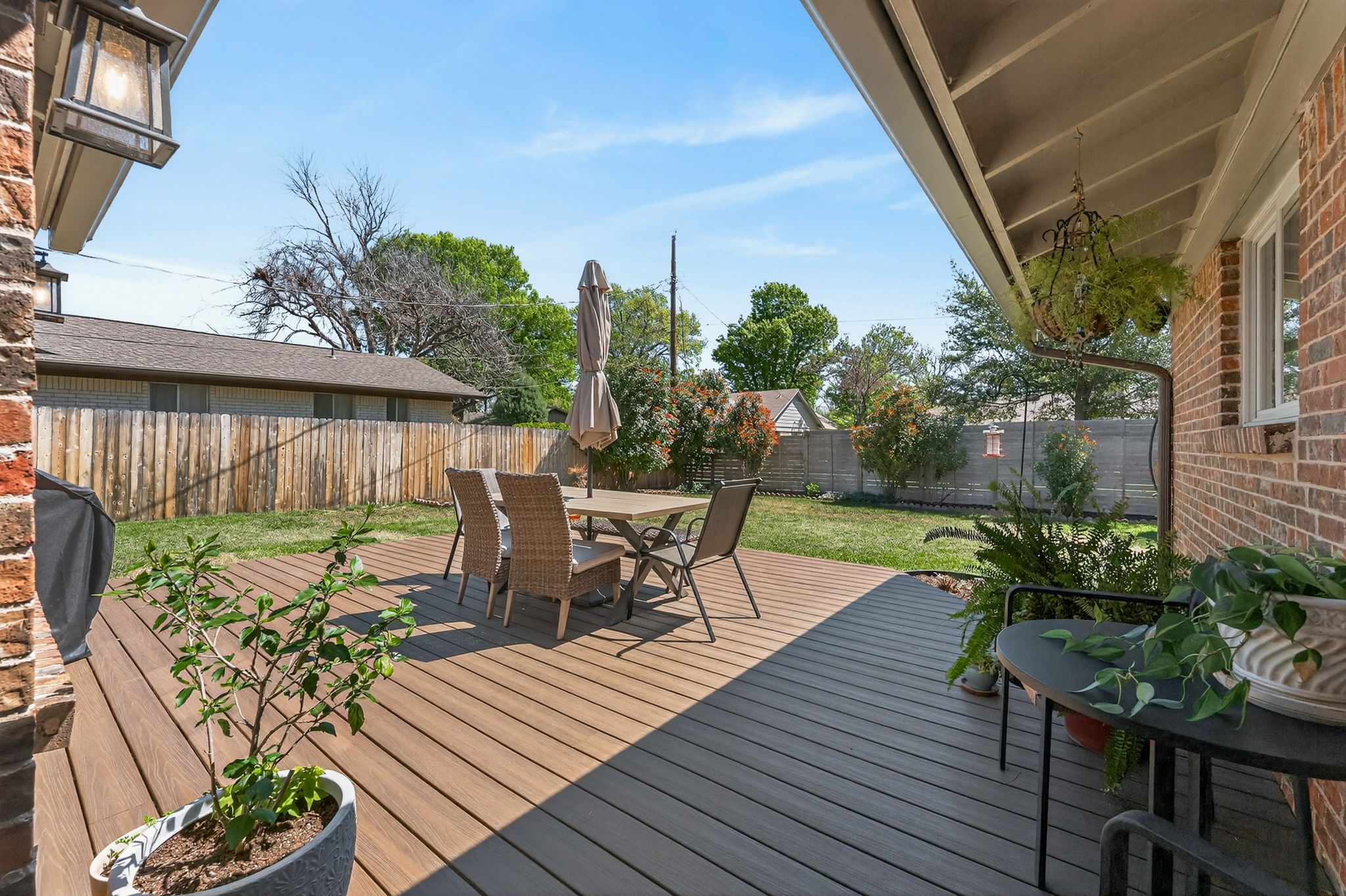 8611 Winding Walk Austin, TX 78757 - Photo 25 of 29 Step out onto a massive deck designed for North Austin summers. There’s ample room for a full dining set and grilling station, making it the ultimate spot for weekend BBQs or morning coffee.
