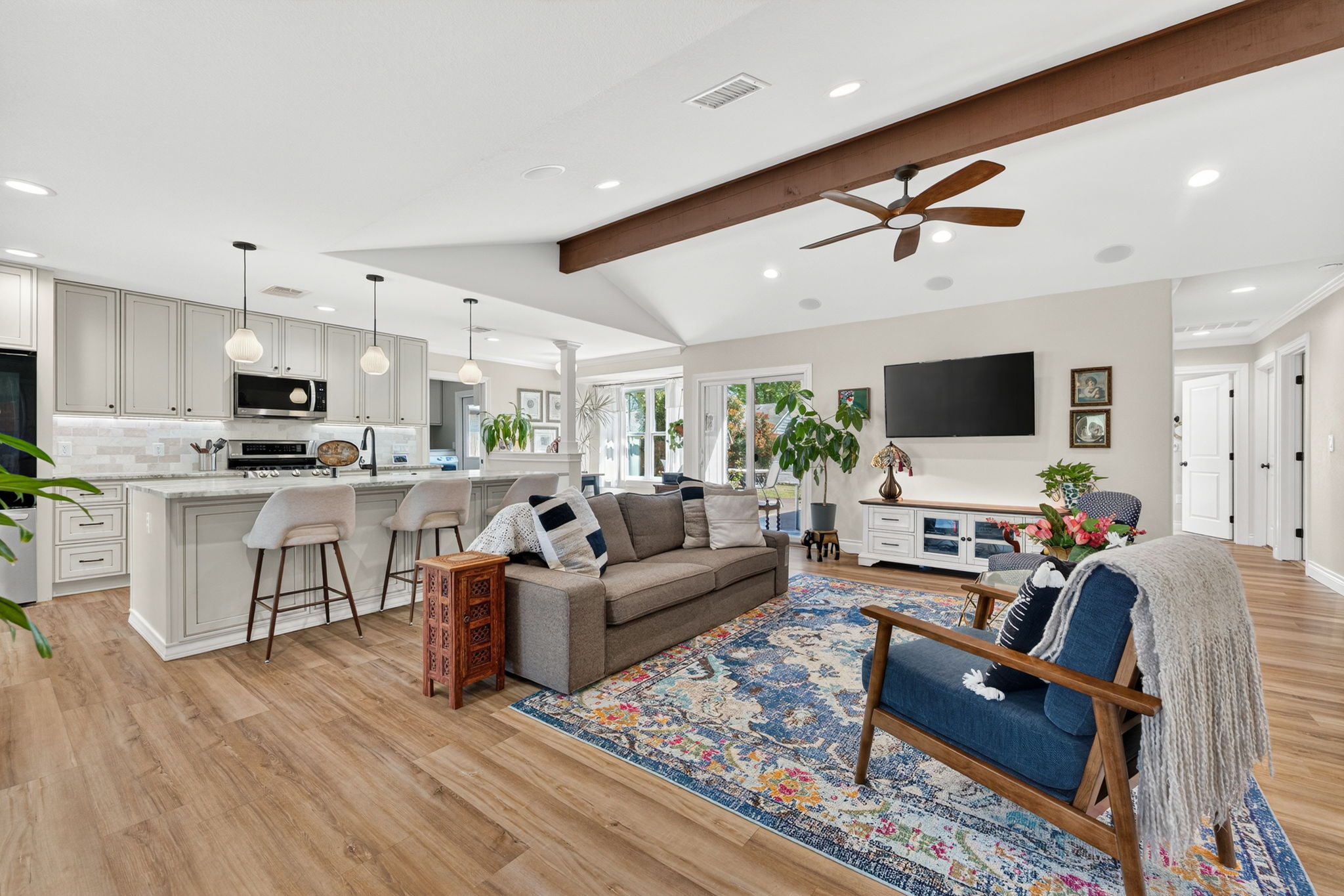 8611 Winding Walk Austin, TX 78757 - Photo 5 of 29 Every inch of this living space is built for connection. The layout is perfect for hosting a lively dinner party or enjoying a quiet movie night.