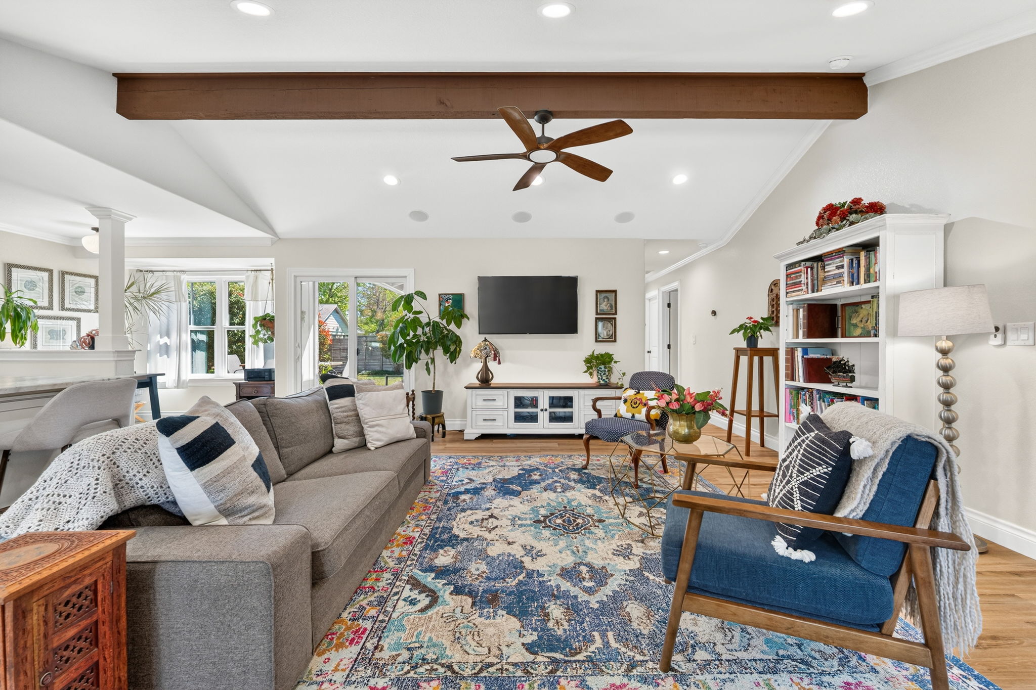 8611 Winding Walk Austin, TX 78757 - Photo 6 of 29 The transition to the outdoors is effortless through sliding glass doors that bring in tons of natural light.