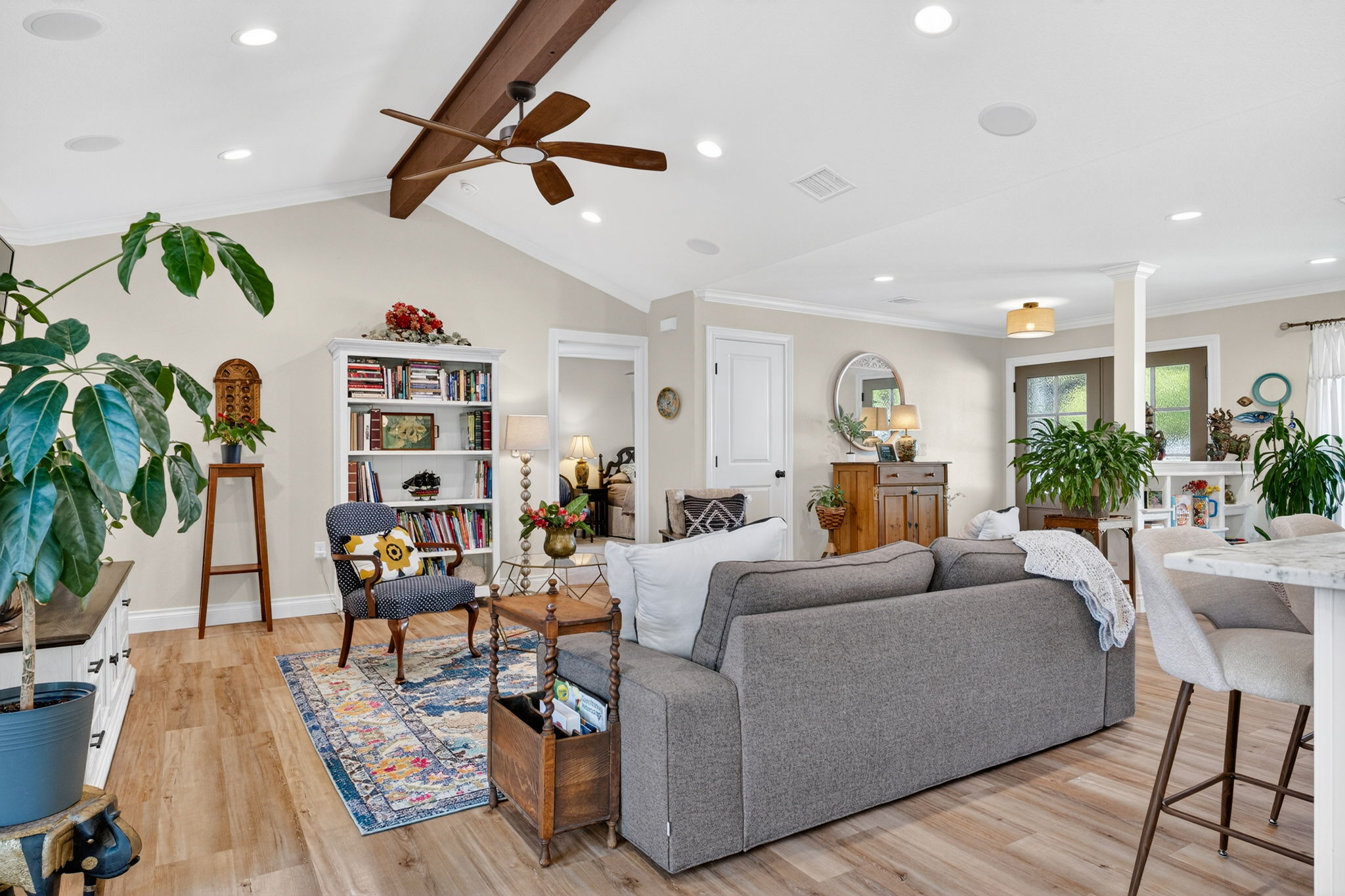 8611 Winding Walk Austin, TX 78757 - Photo 7 of 29 The blend of traditional crown molding with modern flooring creates a transitional style that feels both timeless and current.