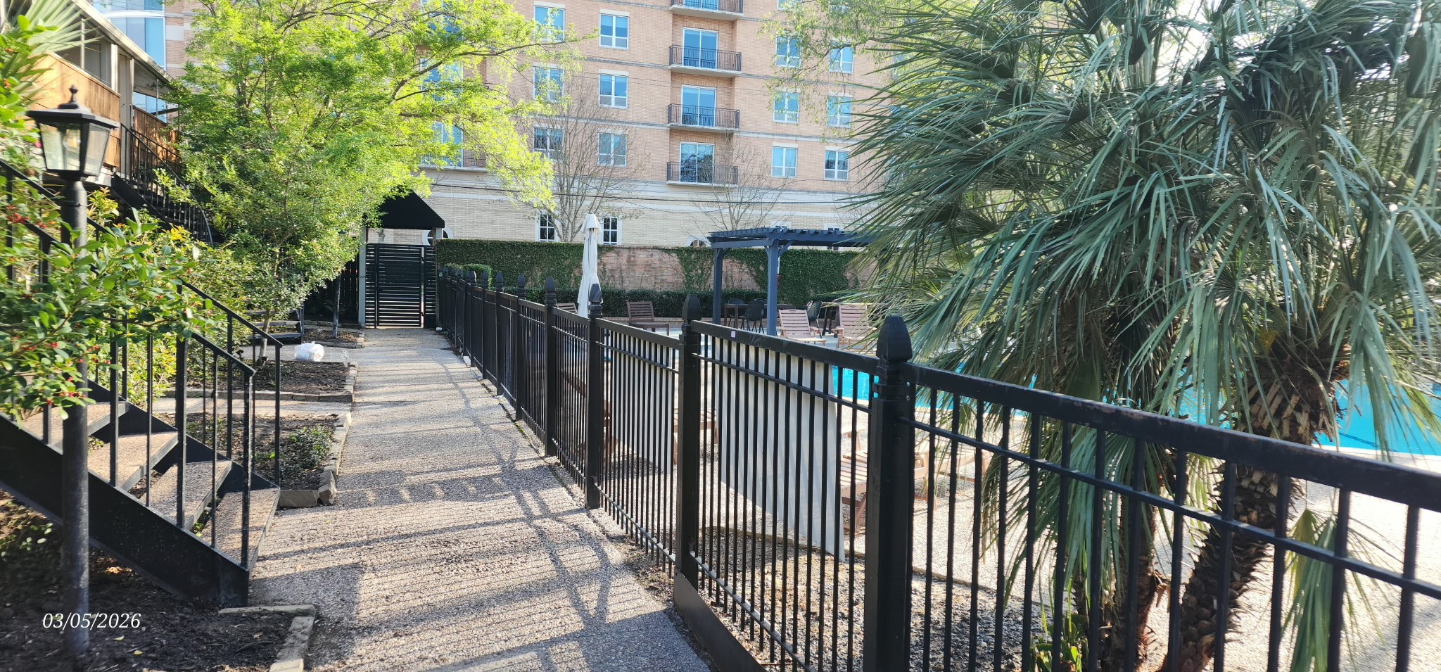 3930 West Alabama Street, Unit 7 Houston, TX 77027 - Photo 29 of 31 a balcony with view of trees