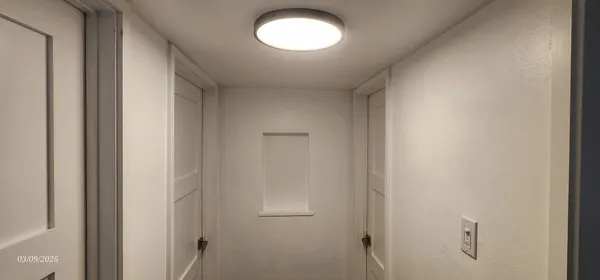 a bathroom with a sink and mirror