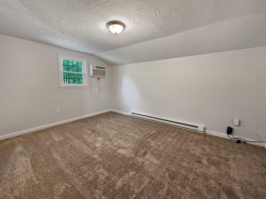15 Cannongate Road, Unit 48 Tyngsborough, MA 01879 - Photo 13 of 25 an empty room with a window