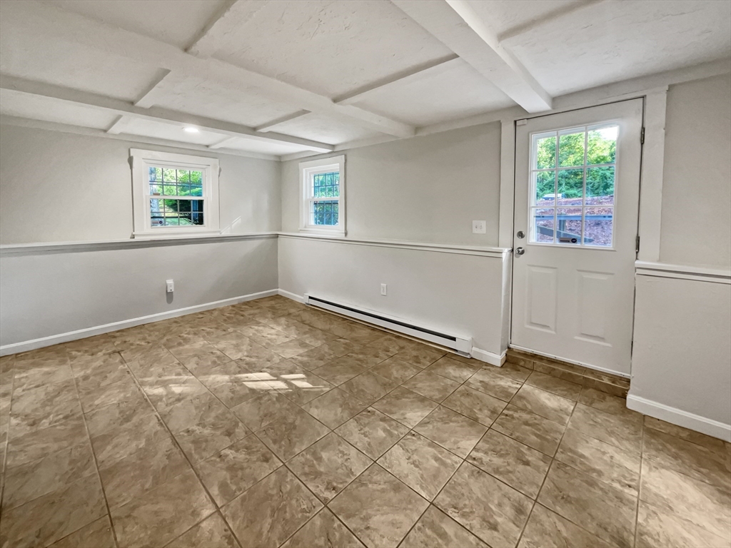 15 Cannongate Road, Unit 48 Tyngsborough, MA 01879 - Photo 23 of 25 a view of an empty room with a window