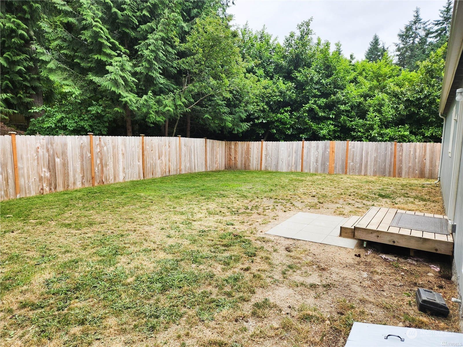 2681 Northeast John Carlson Road Bremerton, WA 98311 - Photo 14 of 15 a view of backyard with wooden fence