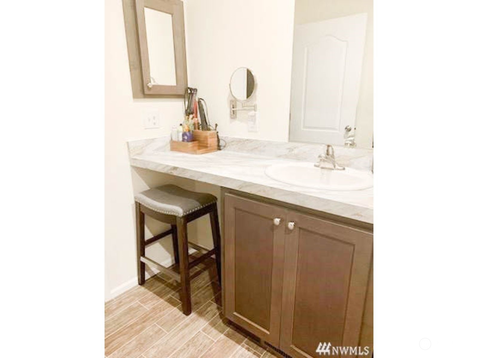 2681 Northeast John Carlson Road Bremerton, WA 98311 - Photo 9 of 15 a bathroom with a sink and a mirror