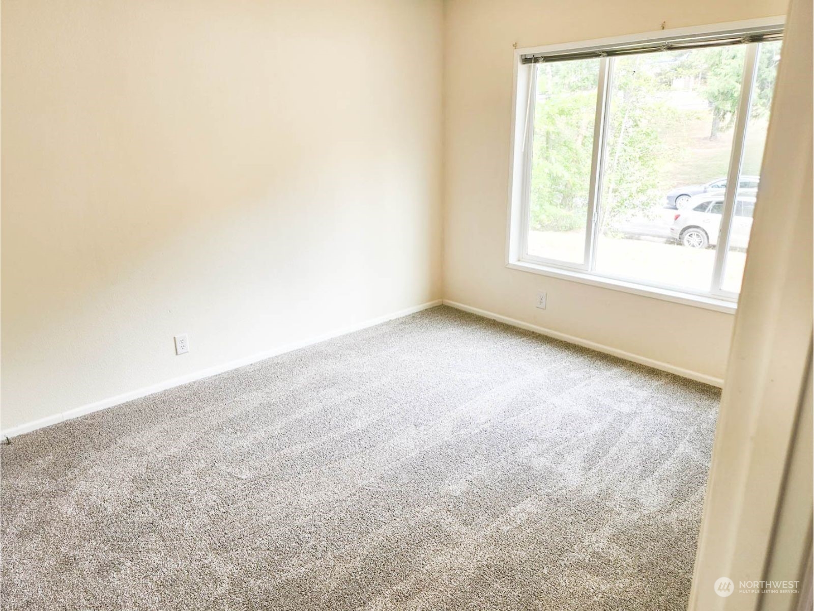2681 Northeast John Carlson Road Bremerton, WA 98311 - Photo 10 of 15 an empty room with a window