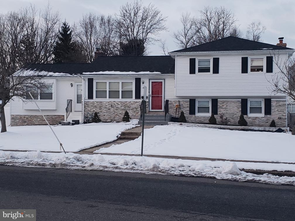 1 Walton Road Mount Holly, NJ 08060 - Photo 3 of 46 a front view of a house with a yard