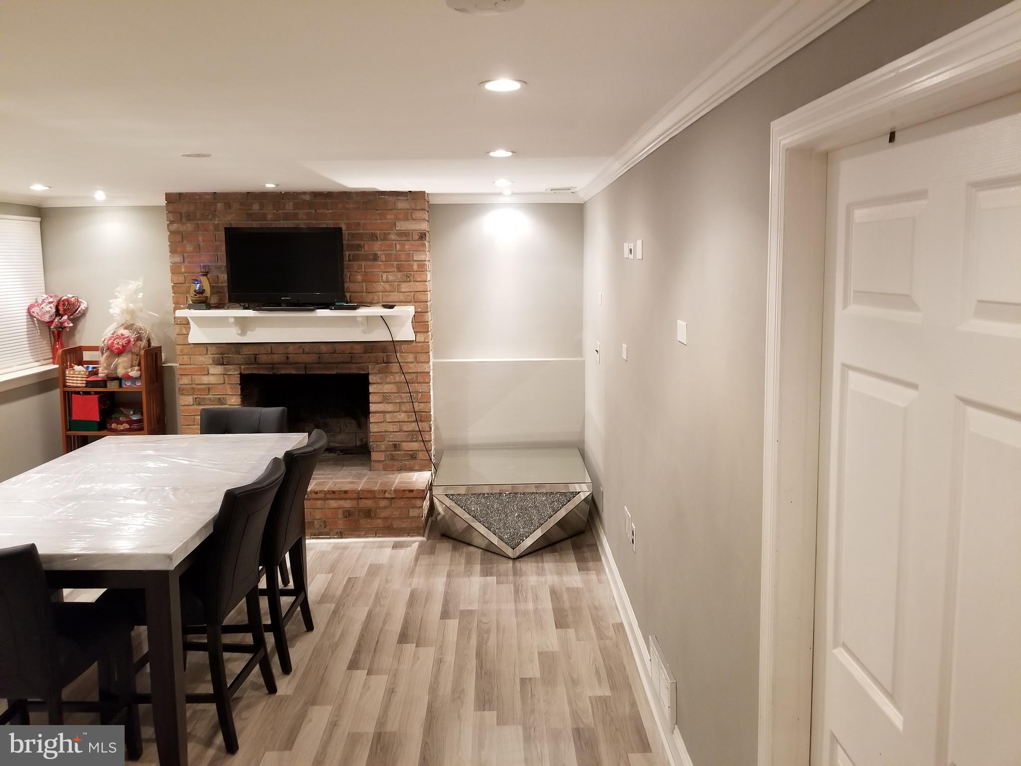 1 Walton Road Mount Holly, NJ 08060 - Photo 25 of 46 a living room with furniture and a fireplace