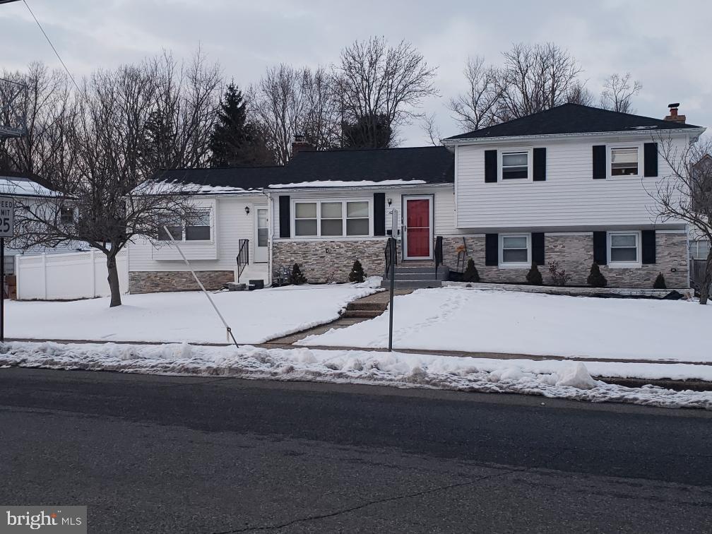 1 Walton Road Mount Holly, NJ 08060 - Photo 4 of 46 a front view of a house with a yard
