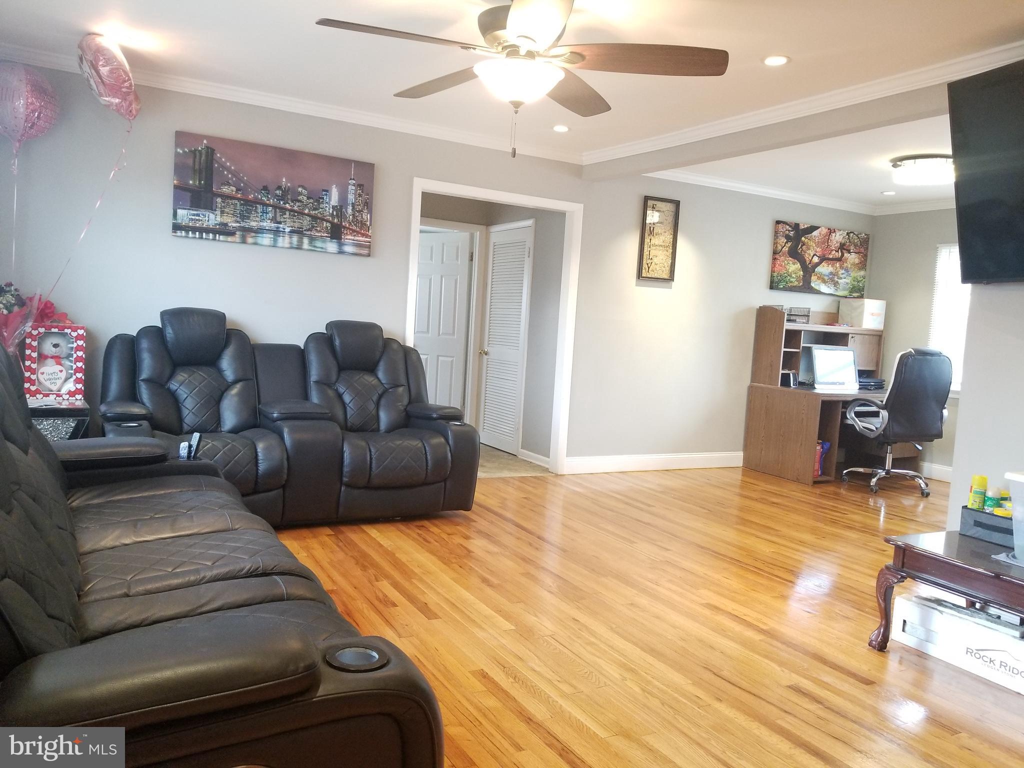 1 Walton Road Mount Holly, NJ 08060 - Photo 5 of 46 a living room with furniture and a wooden floor