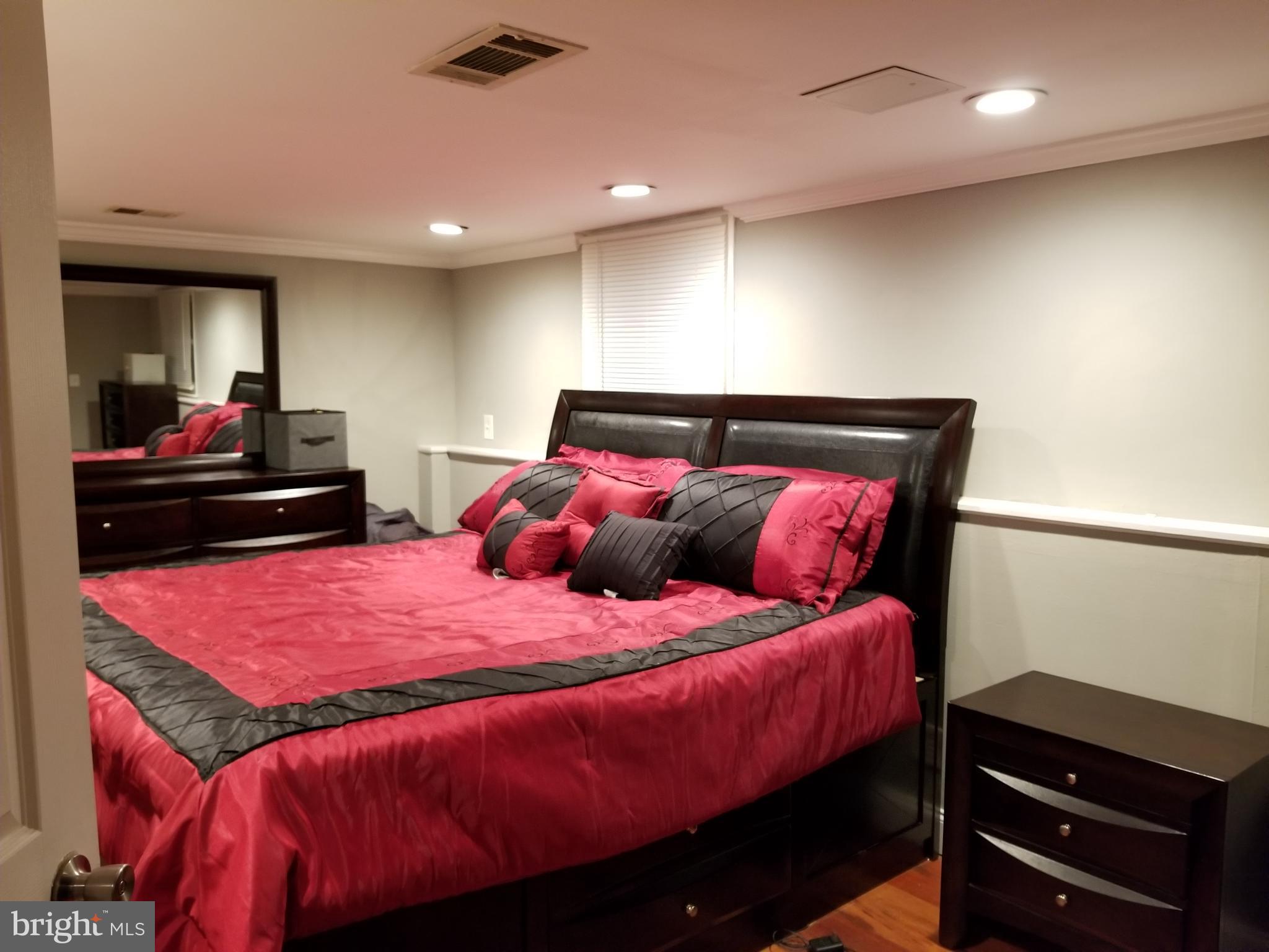 1 Walton Road Mount Holly, NJ 08060 - Photo 41 of 46 a bedroom with a bed and a dresser