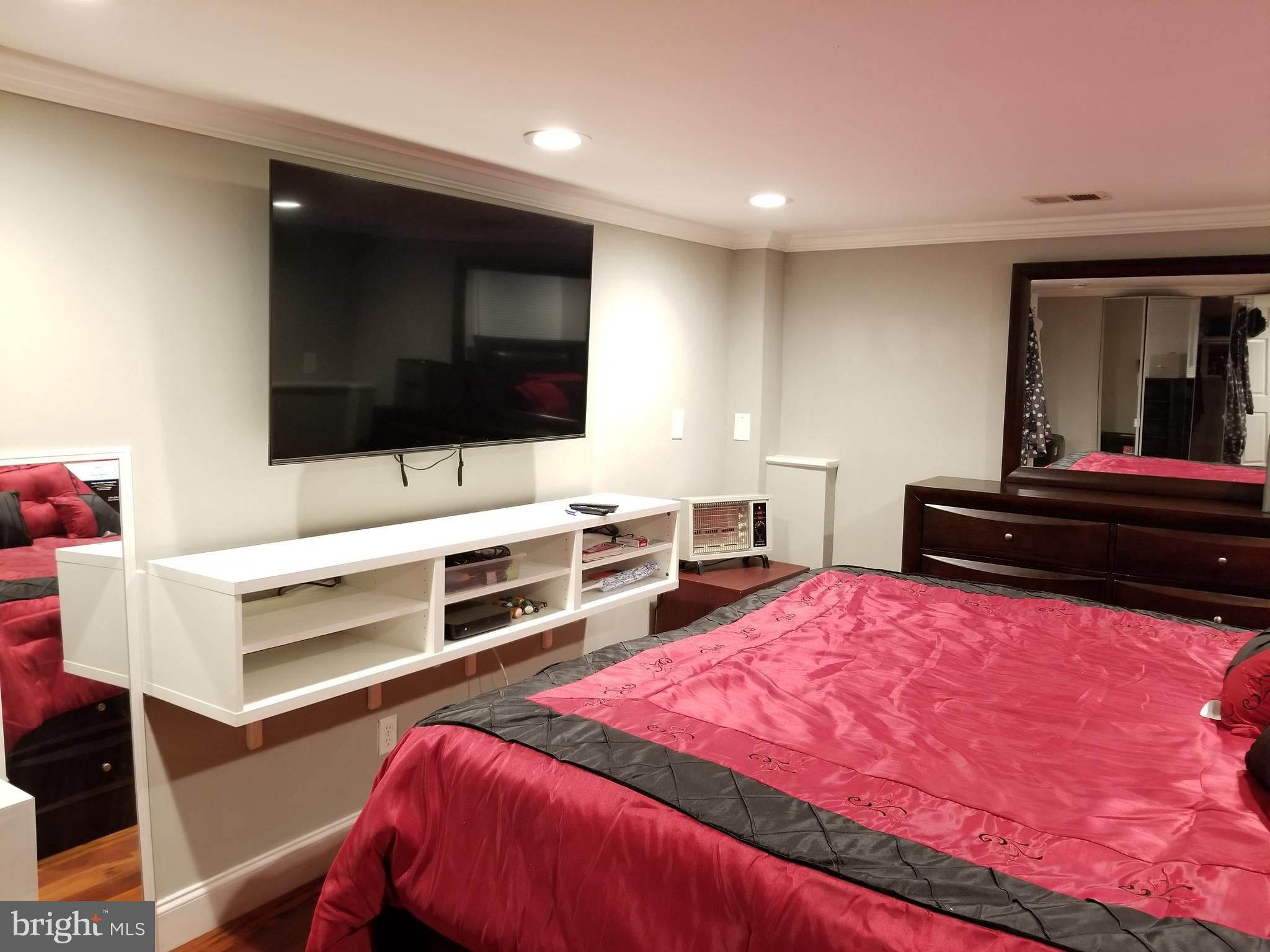 1 Walton Road Mount Holly, NJ 08060 - Photo 42 of 46 a living room with furniture and a flat screen tv