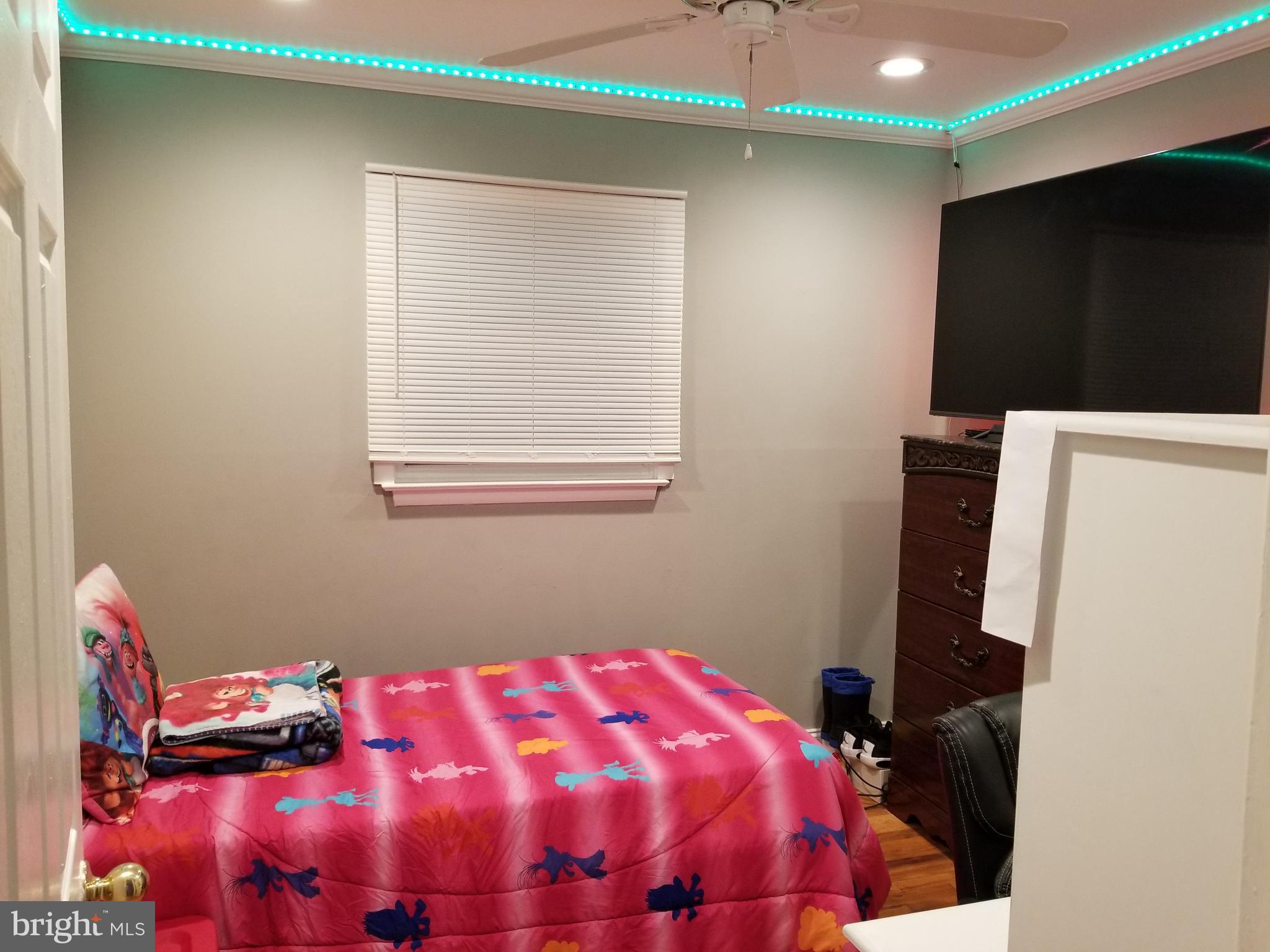 1 Walton Road Mount Holly, NJ 08060 - Photo 44 of 46 a bedroom with a bed and a mirror