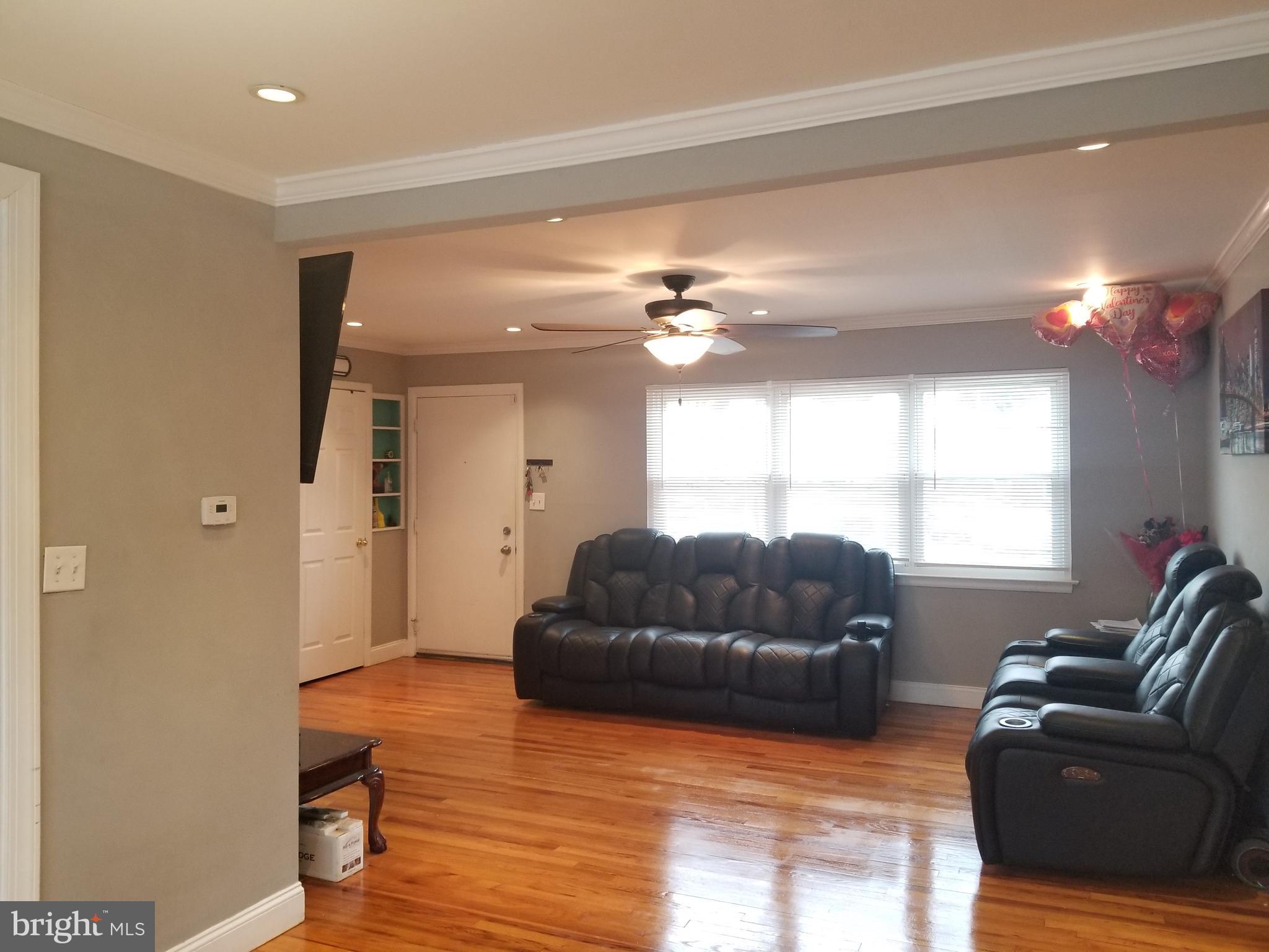 1 Walton Road Mount Holly, NJ 08060 - Photo 7 of 46 a living room with furniture and a large window