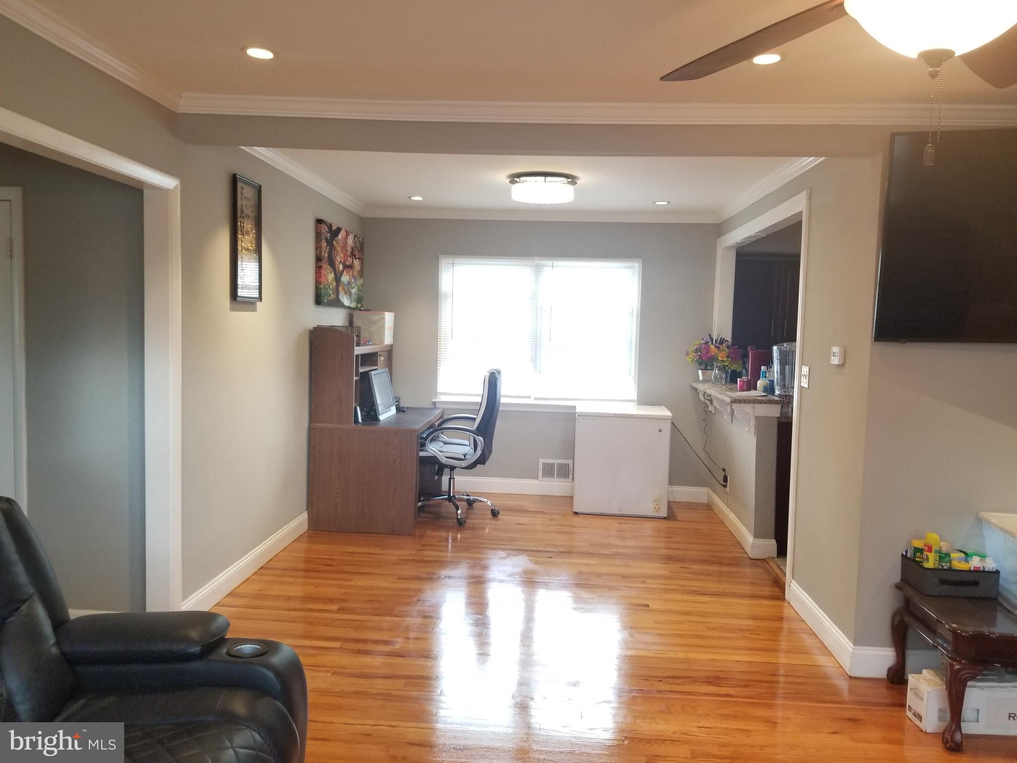 1 Walton Road Mount Holly, NJ 08060 - Photo 9 of 46 a living room with furniture and a wooden floor