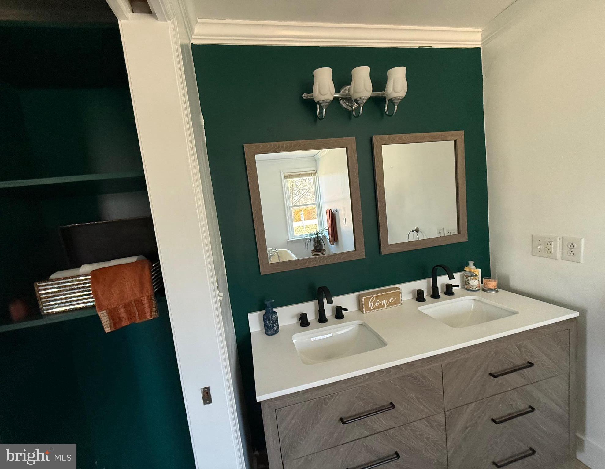 23055 Old Fairlee Road Chestertown, MD 21620 - Photo 15 of 26 a bathroom with a sink and a mirror