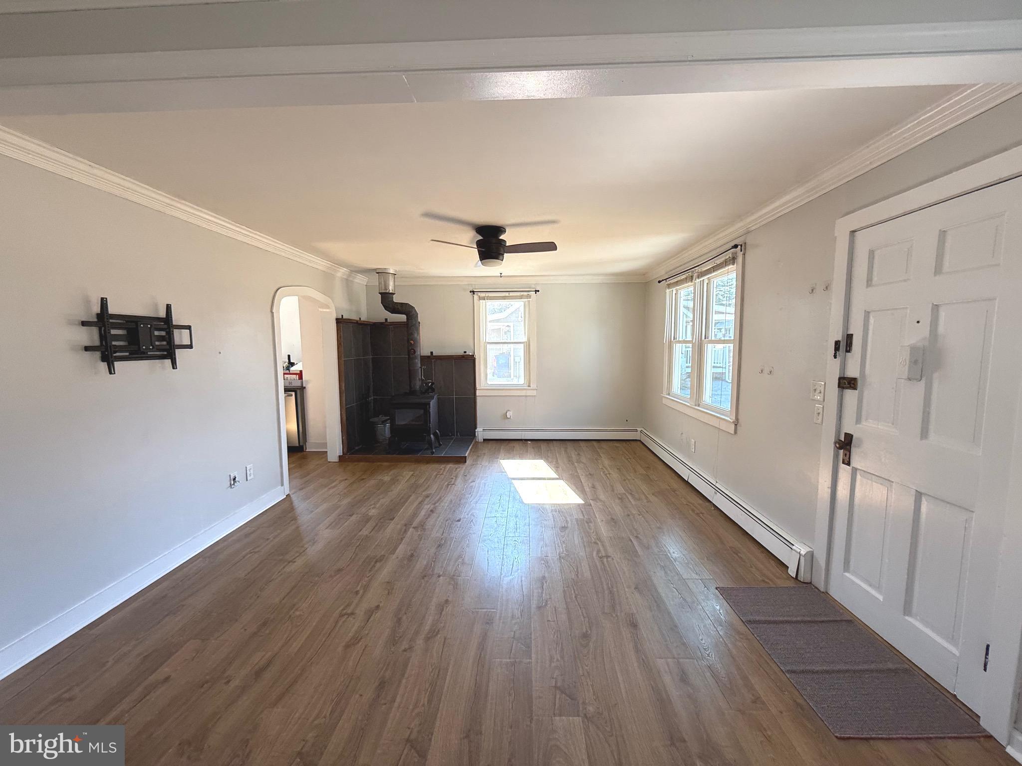 23055 Old Fairlee Road Chestertown, MD 21620 - Photo 9 of 26 a view of empty room with wooden floor and window