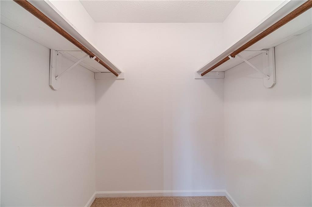 119 West Ash Street Social Circle, GA 30025 - Photo 22 of 44 a view of small space with racks on the wall