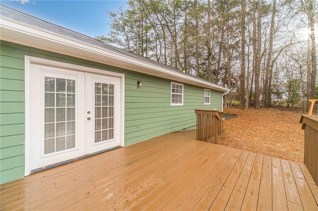 119 West Ash Street Social Circle, GA 30025 - Photo 36 of 44 a view of a house with a yard