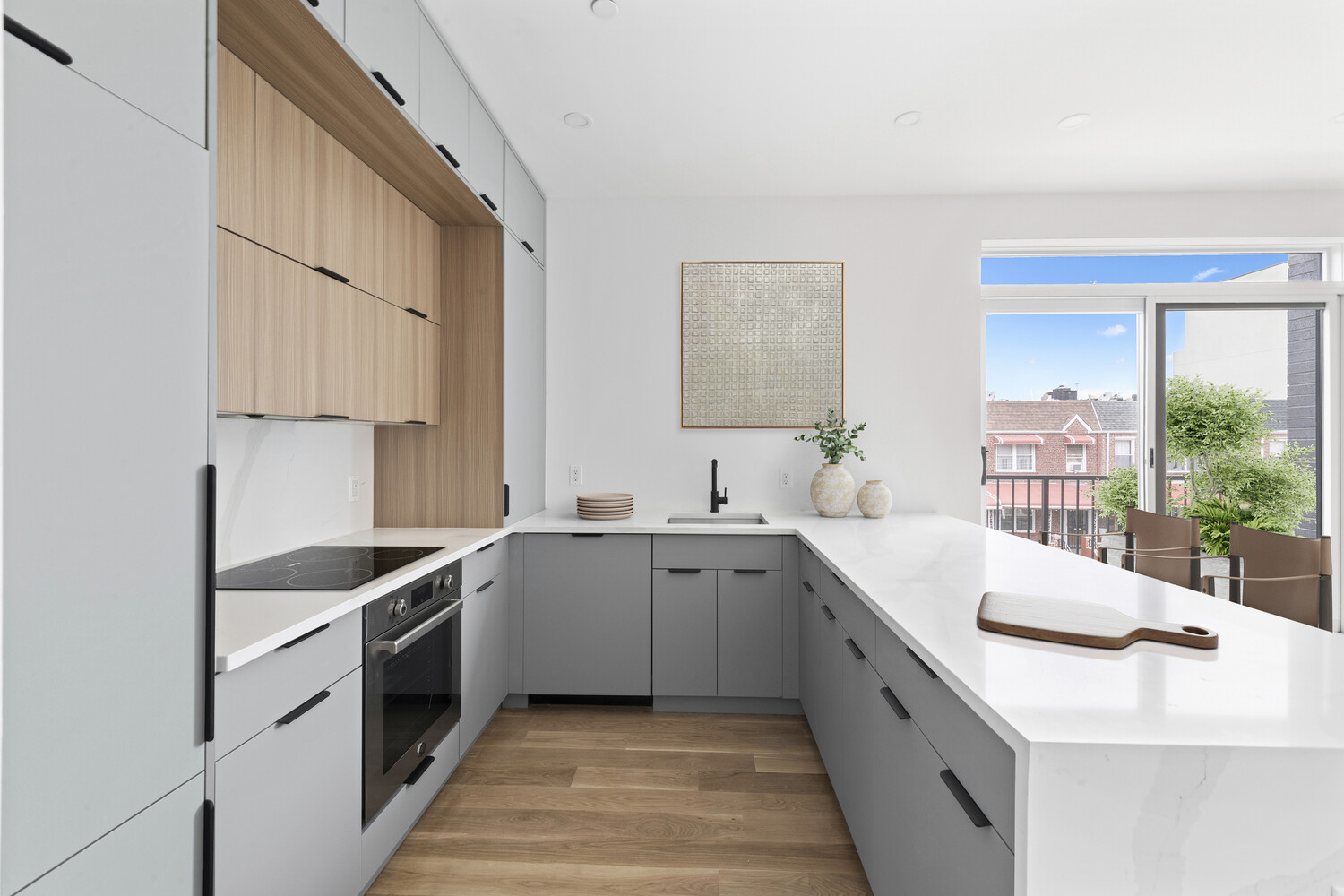 831 Knickerbocker Avenue, Unit 3B Brooklyn, NY 11207 - Photo 3 of 11 a kitchen with a sink and cabinets