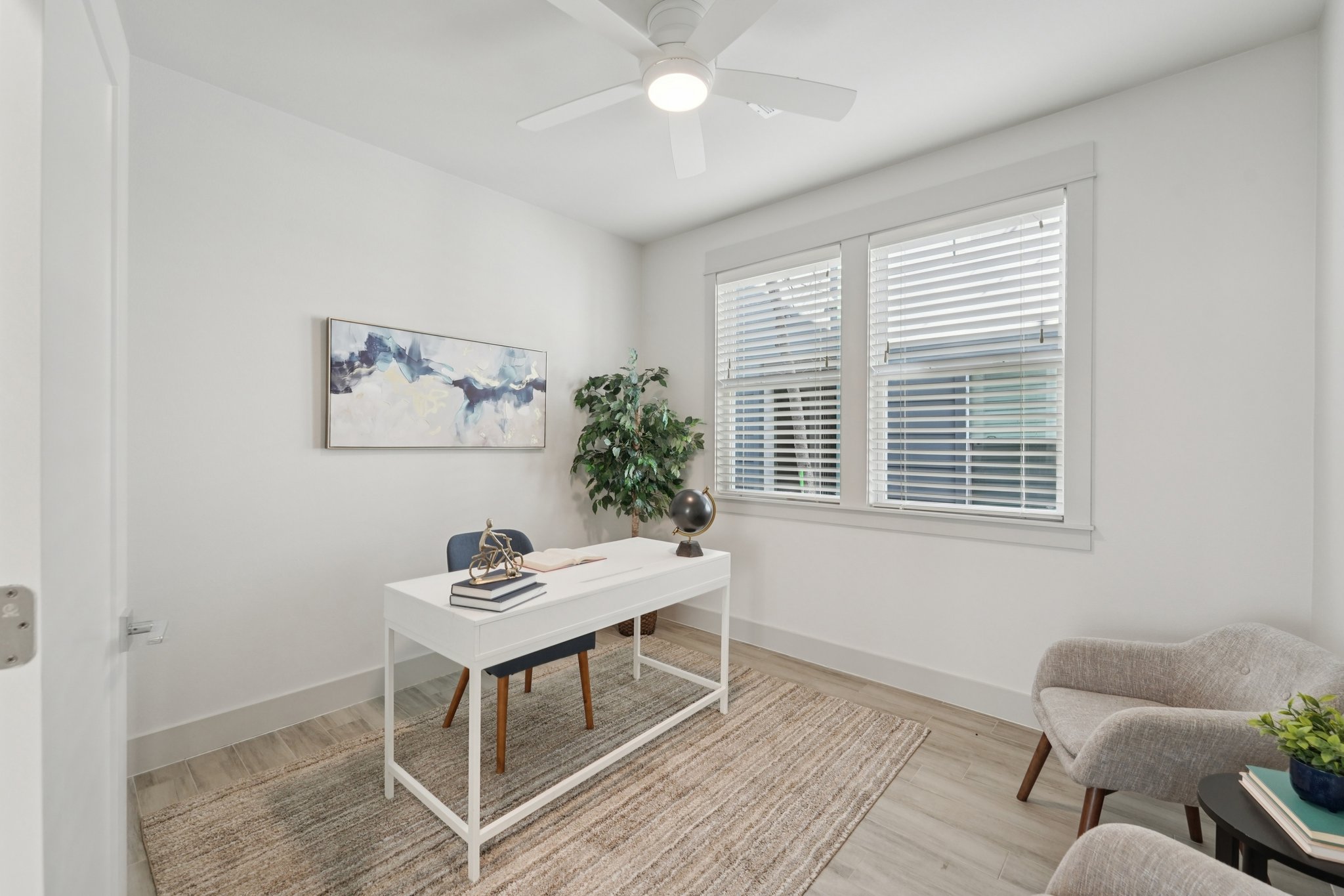 3711 Cedar Street Austin, TX 78705 - Photo 18 of 40 a view of a workspace with furniture and a window