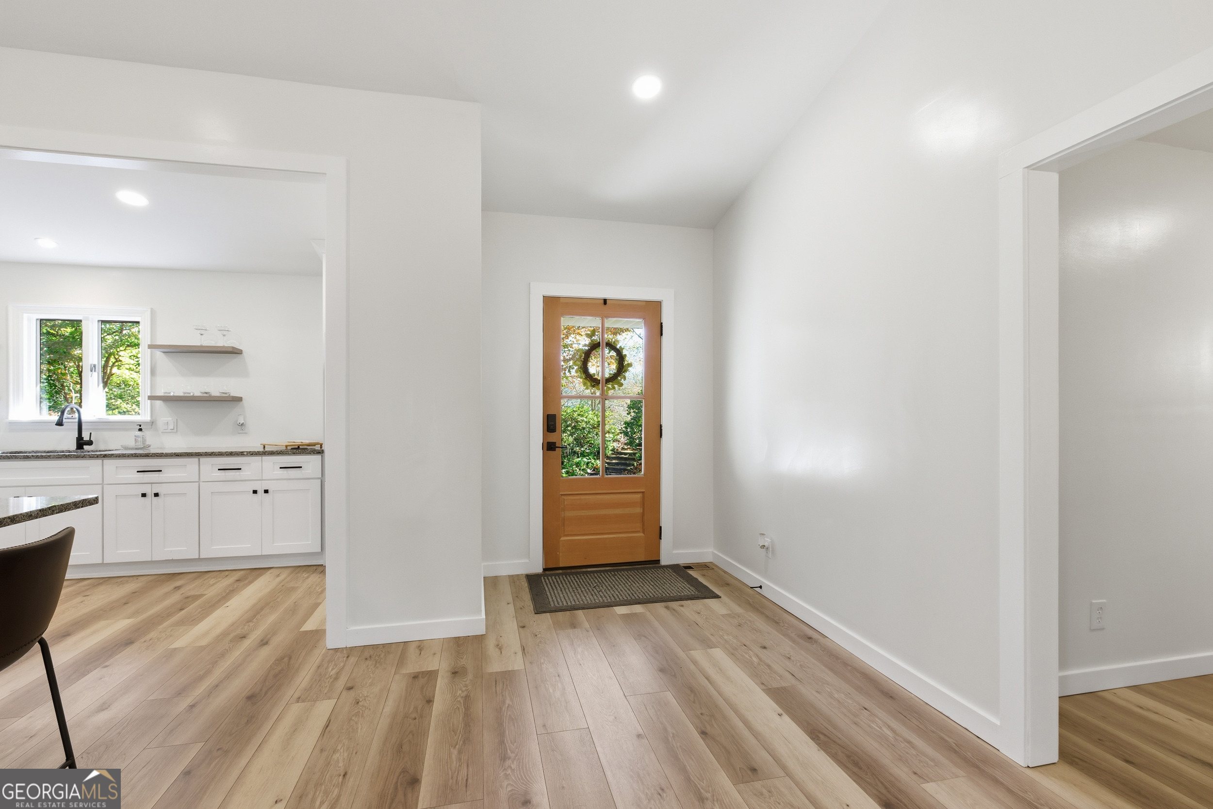 230 Majors Lane Rabun Gap, GA 30568 - Photo 20 of 54 a view of kitchen with wooden floor electronic appliances and window