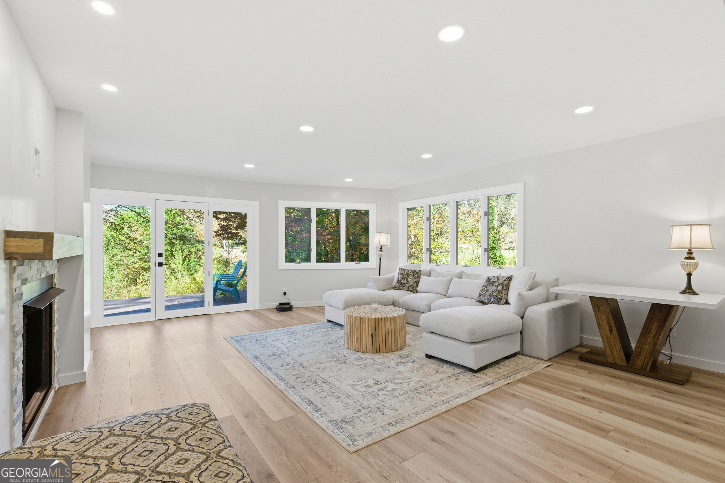 230 Majors Lane Rabun Gap, GA 30568 - Photo 2 of 54 a living room with furniture and a fireplace