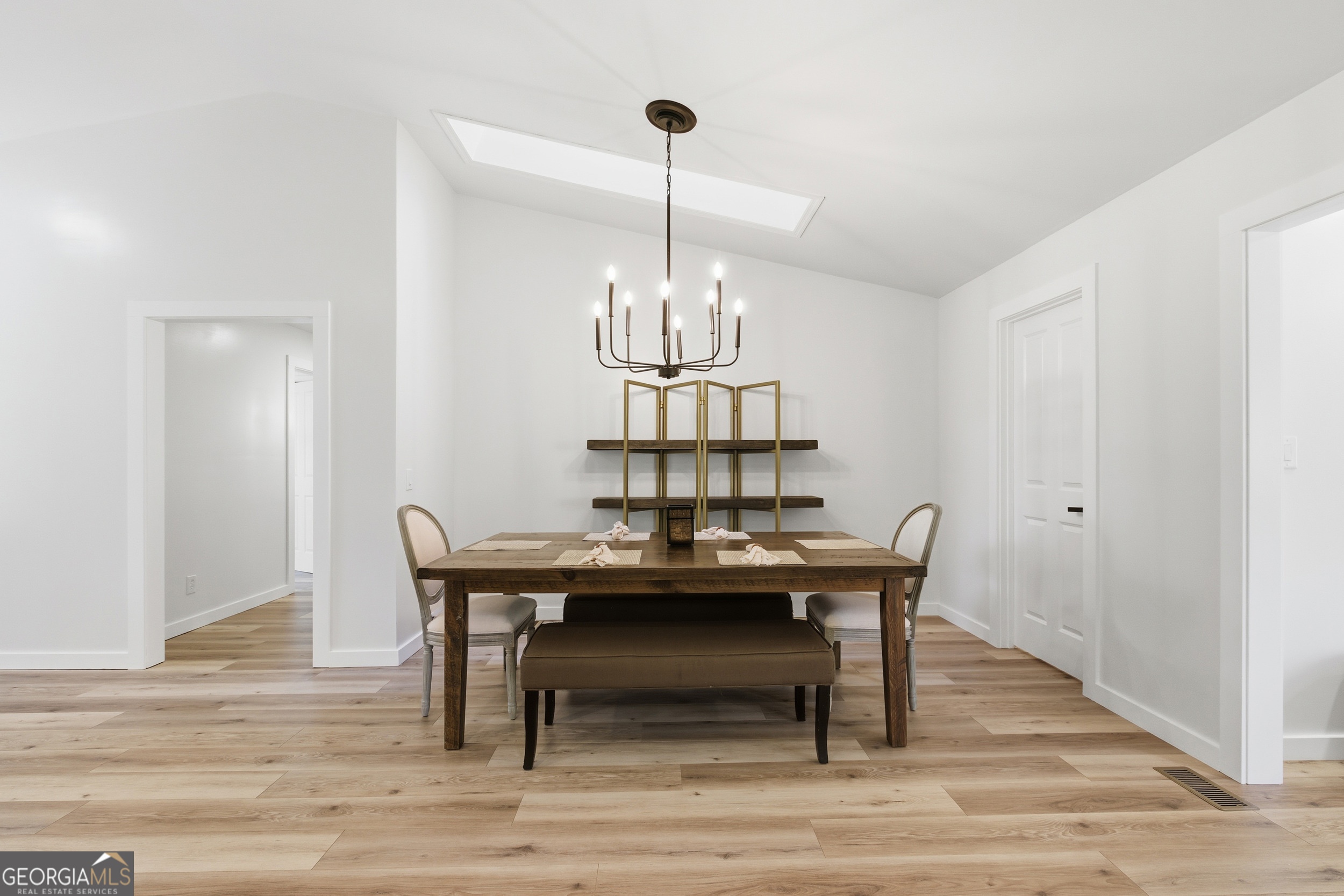 230 Majors Lane Rabun Gap, GA 30568 - Photo 27 of 54 a view of a dining room with furniture wooden floor and chandelier