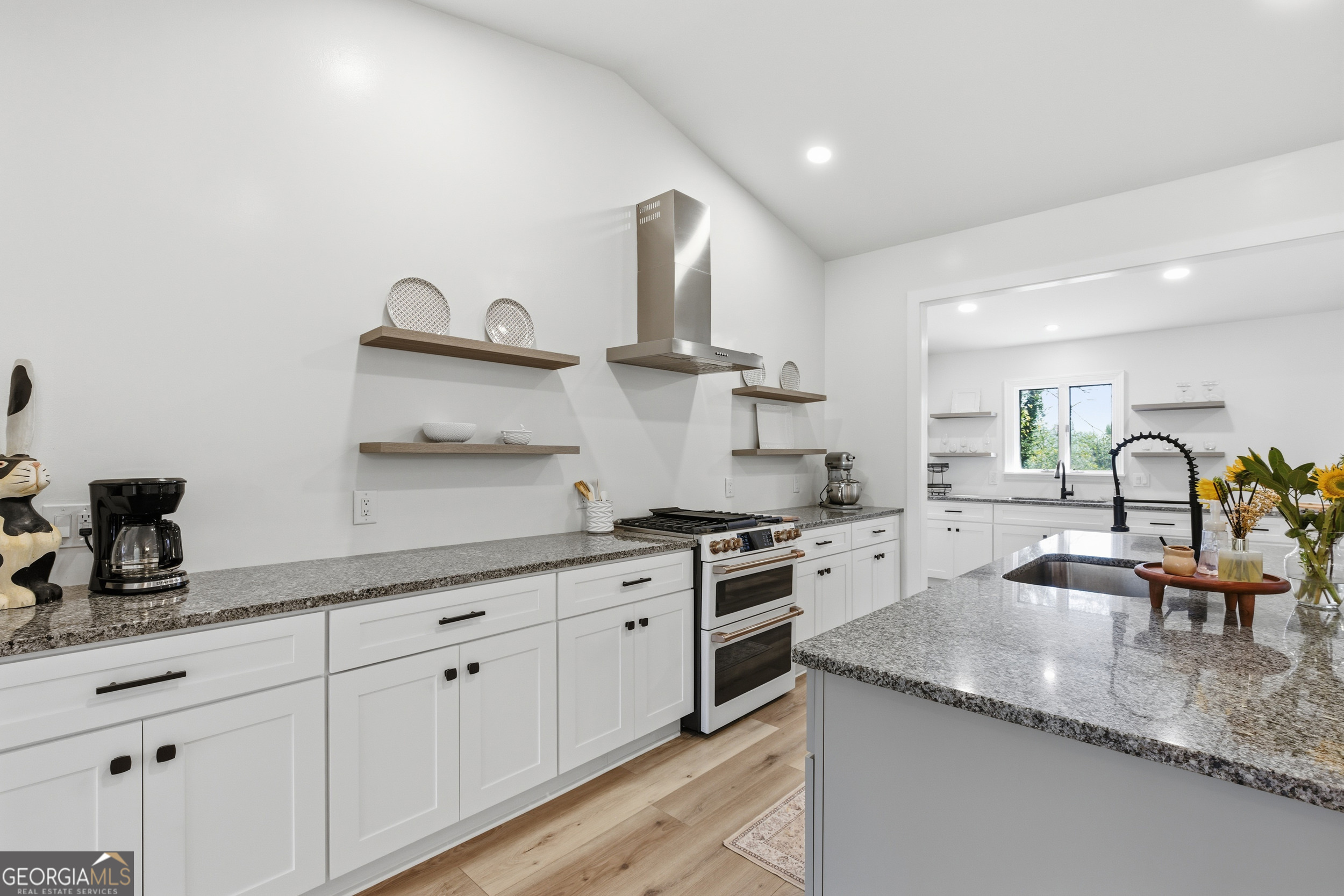 230 Majors Lane Rabun Gap, GA 30568 - Photo 3 of 54 a kitchen with granite countertop a sink stainless steel appliances and cabinets