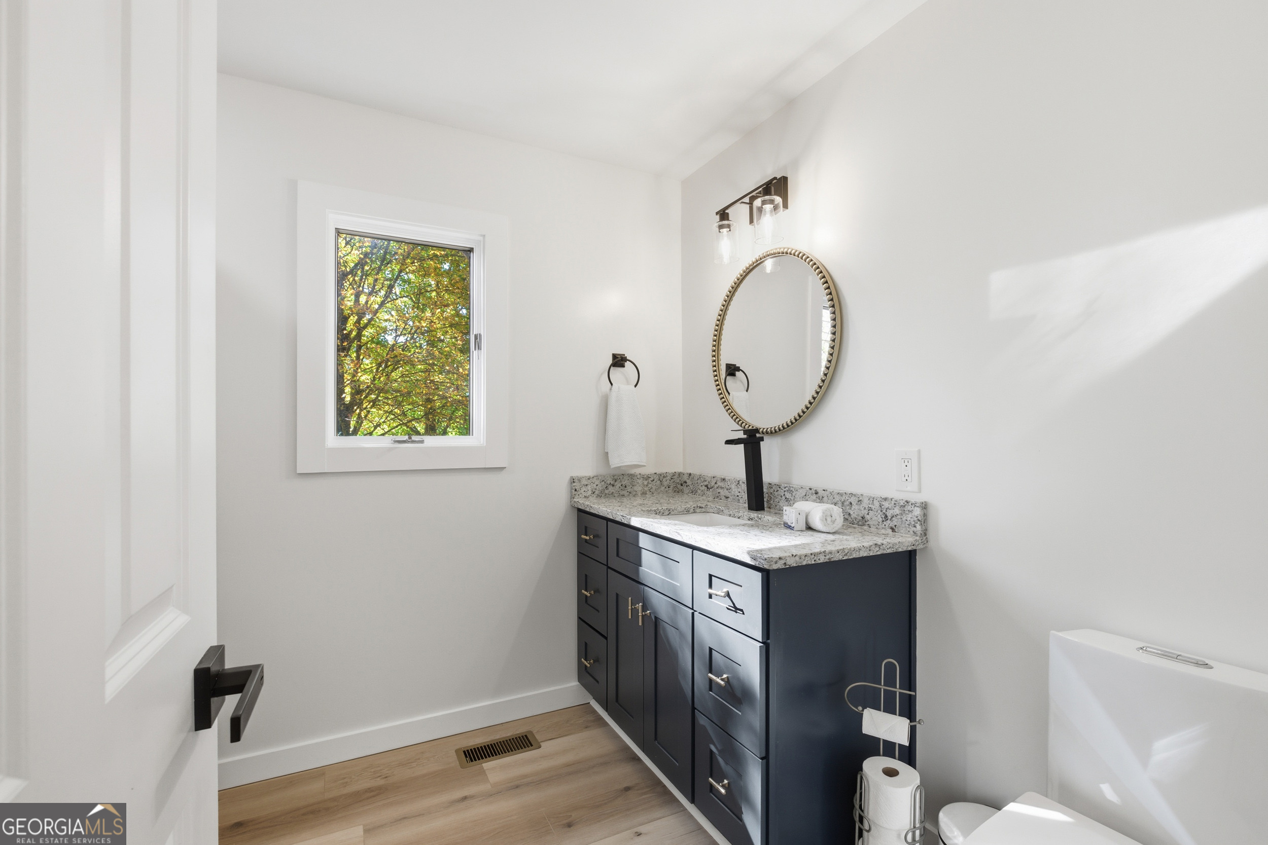230 Majors Lane Rabun Gap, GA 30568 - Photo 33 of 54 a view of a bathroom with a sink and a mirror