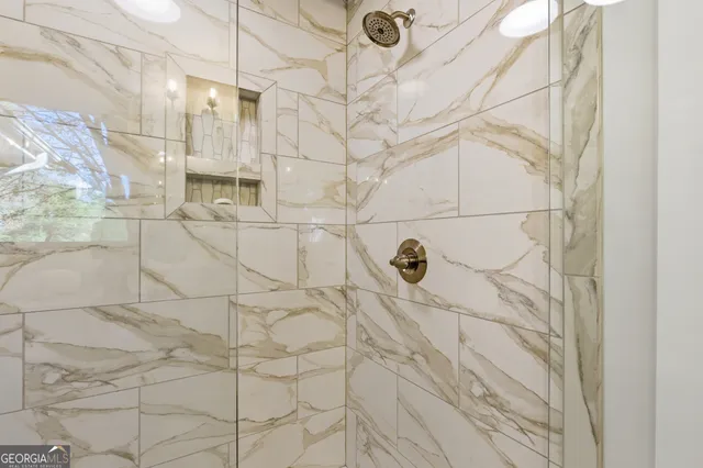 a view of a grassy area with an trees