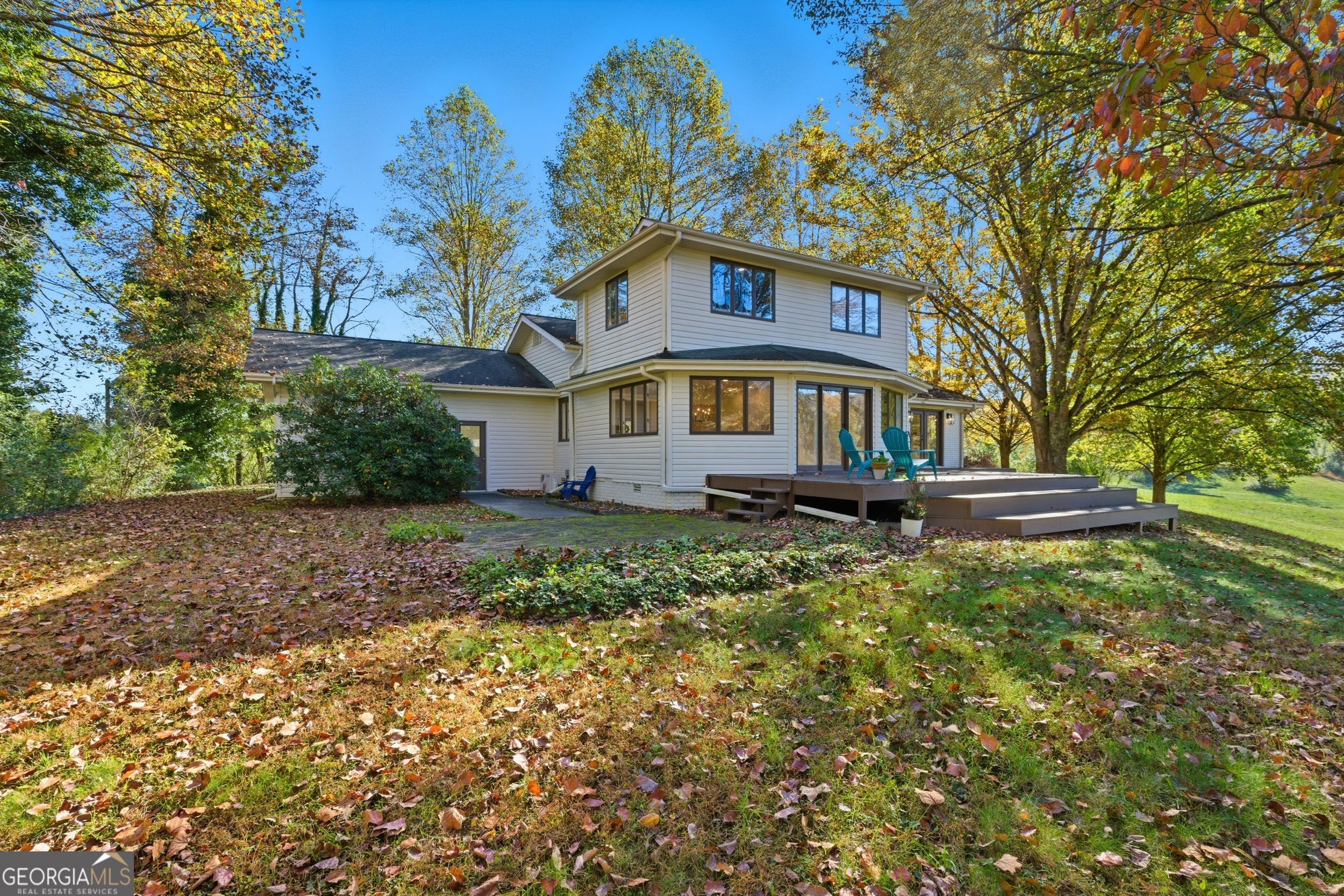 230 Majors Lane Rabun Gap, GA 30568 - Photo 40 of 54 a front view of a house with a yard
