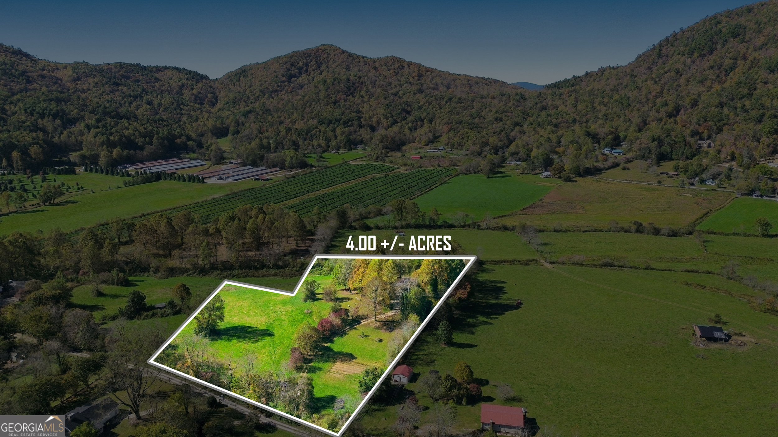 230 Majors Lane Rabun Gap, GA 30568 - Photo 43 of 54 a view of a wooden deck with a lake view