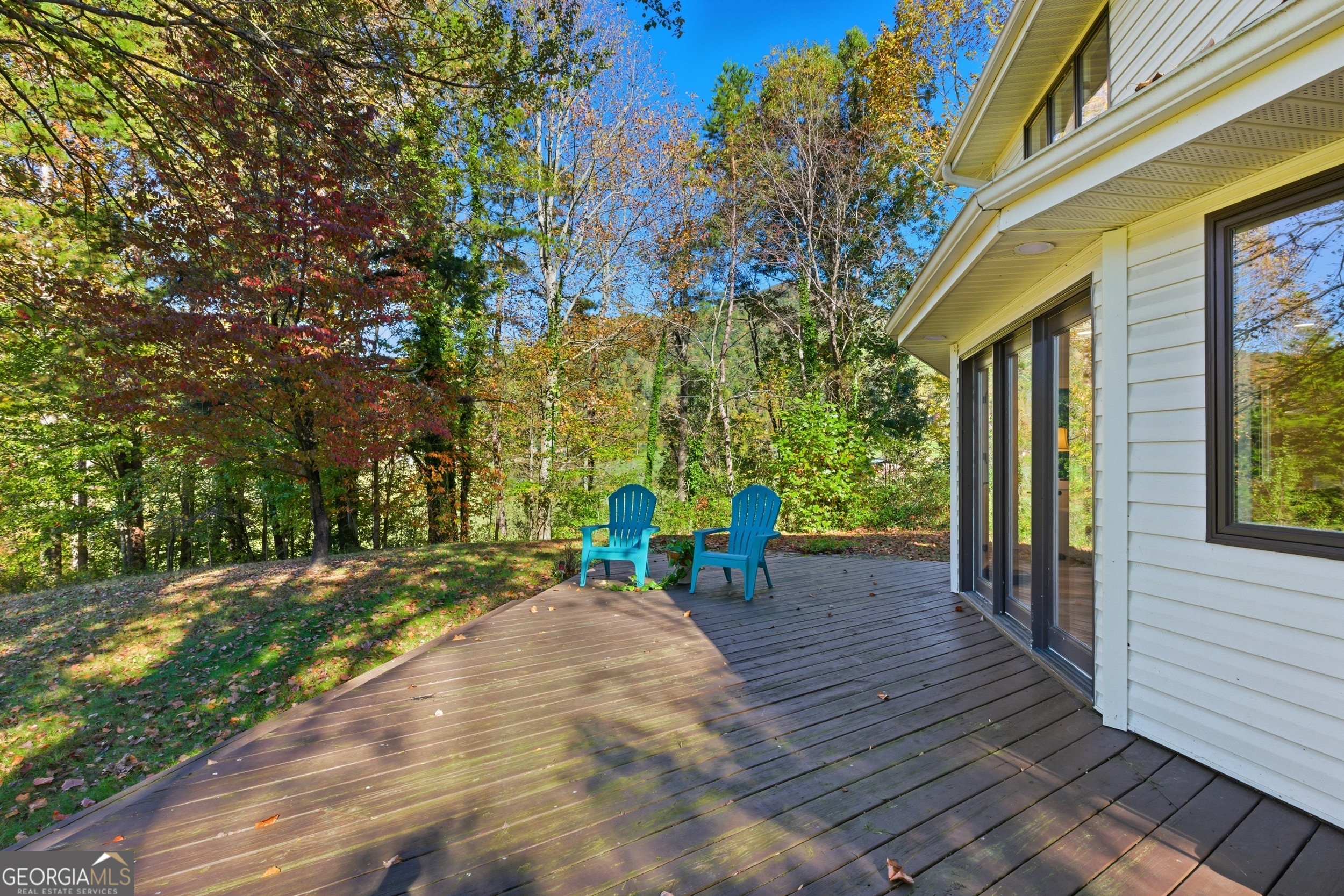 230 Majors Lane Rabun Gap, GA 30568 - Photo 47 of 54 a view of a chair and table in backyard of the house