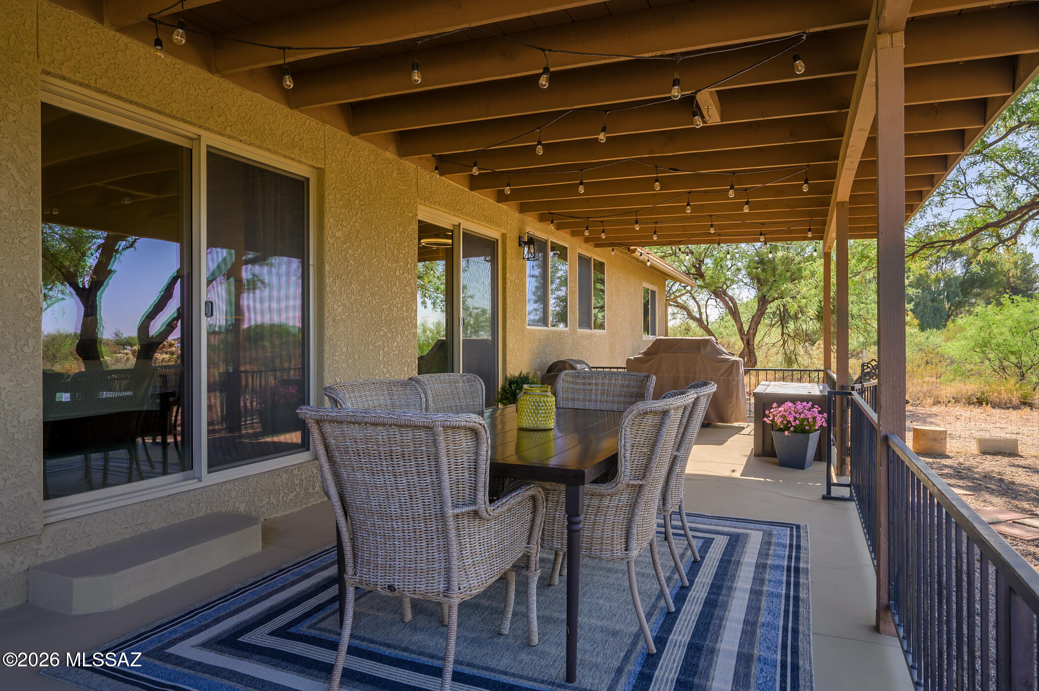13599 East Rincon Ranch Road Vail, AZ 85641 - Photo 33 of 41 a view of a porch with furniture and yard