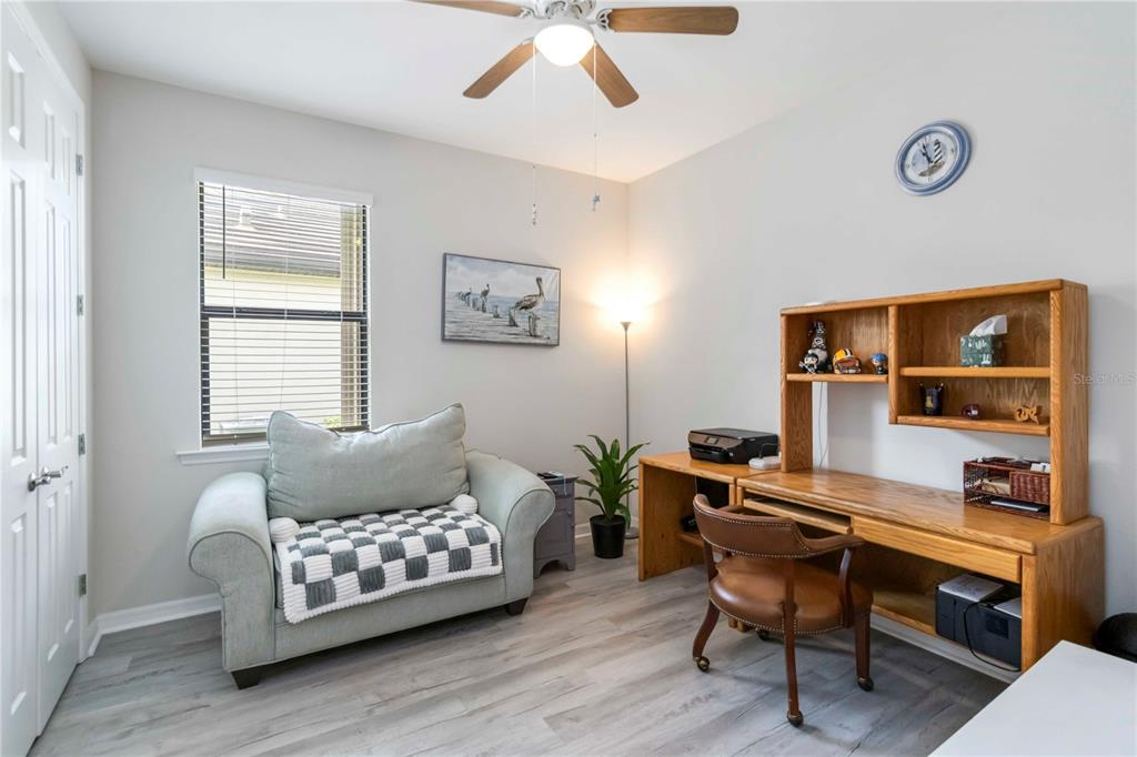 20765 Swallowtail Court Venice, FL 34293 - Photo 24 of 50 a living room with furniture and a window