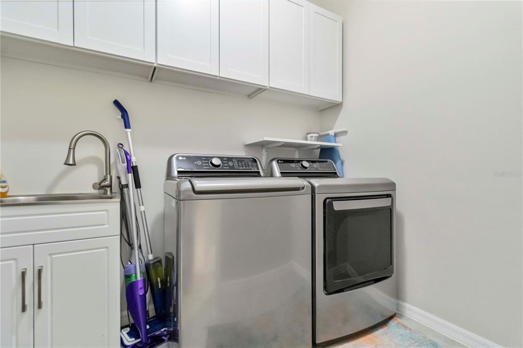 20765 Swallowtail Court Venice, FL 34293 - Photo 26 of 50 a utility room with dryer and washer