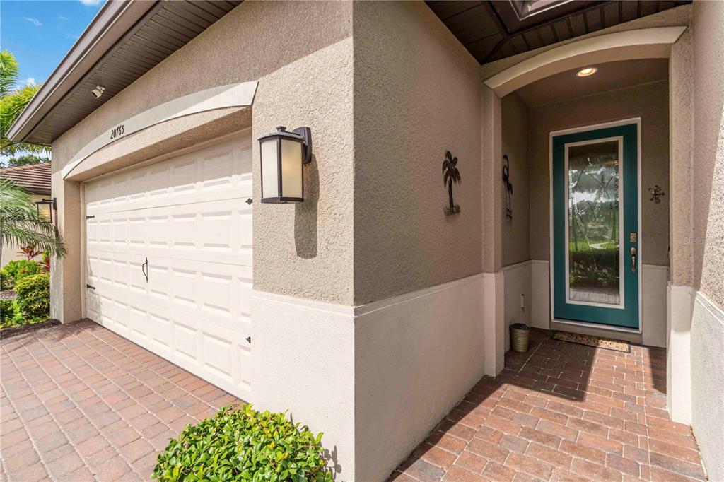 20765 Swallowtail Court Venice, FL 34293 - Photo 4 of 50 a view of a front door of a house