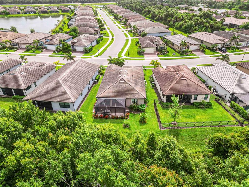 20765 Swallowtail Court Venice, FL 34293 - Photo 41 of 50 an aerial view of residential houses with outdoor space and swimming pool