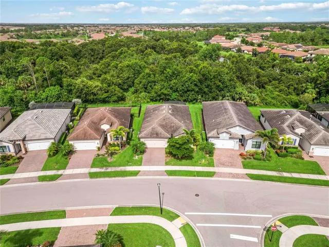 an aerial view of a house with a garden