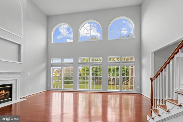 a view of an entryway with wooden floor