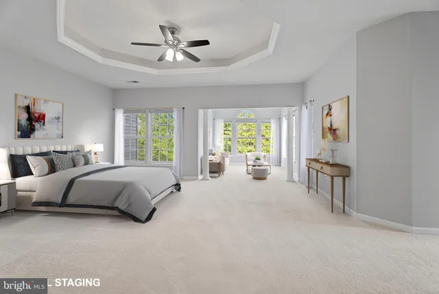 a bedroom with a bed furniture and a window