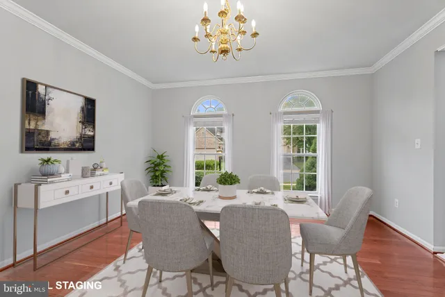 a living room with furniture and windows