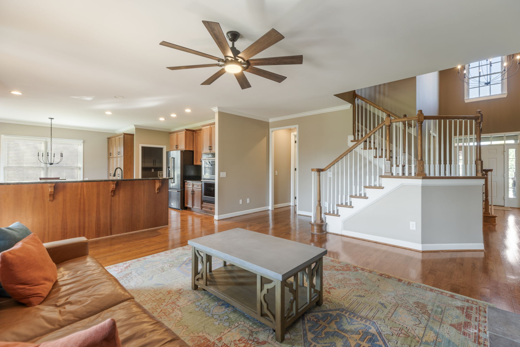 3517 Union Village Road Thompson's Station, TN 37179 - Photo 19 of 94 a living room with furniture kitchen view and a wooden floor