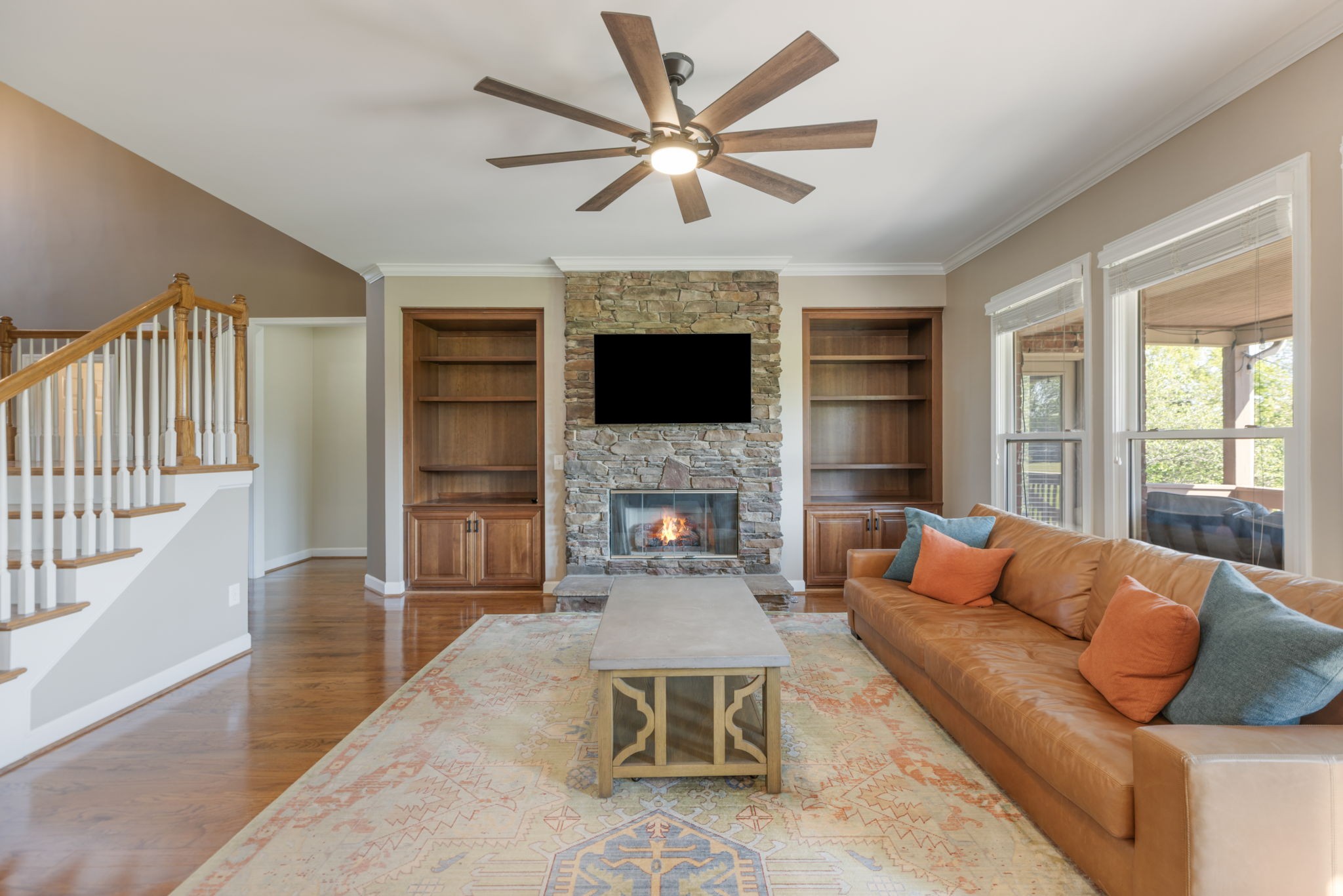 3517 Union Village Road Thompson's Station, TN 37179 - Photo 21 of 94 a living room with furniture ceiling fan and a fireplace