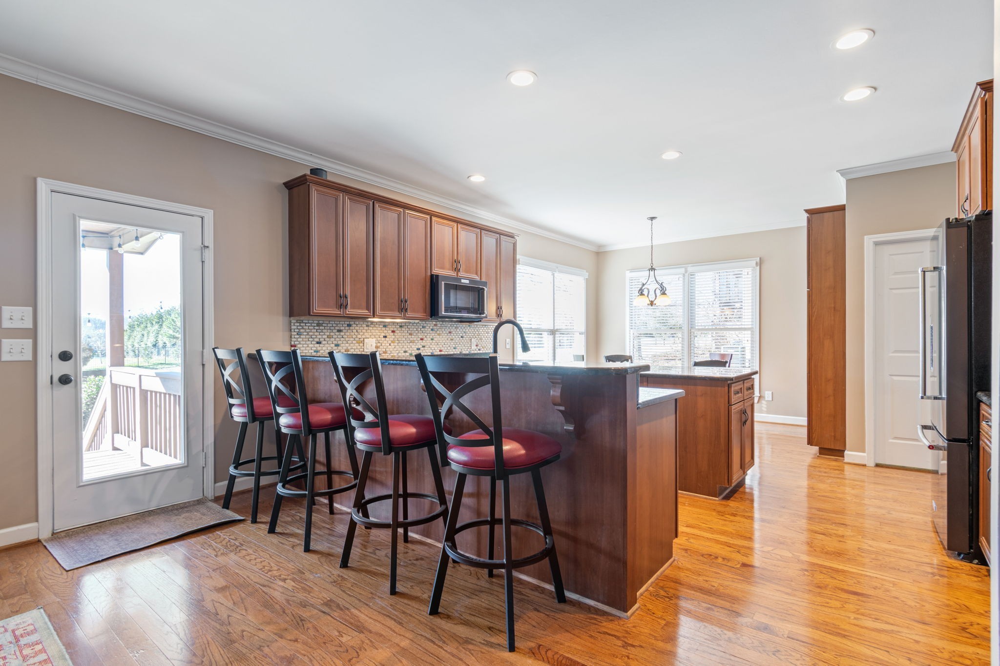 3517 Union Village Road Thompson's Station, TN 37179 - Photo 23 of 94 a view of a dining room with furniture and wooden floor